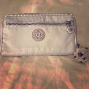 Kipling silver wallet.